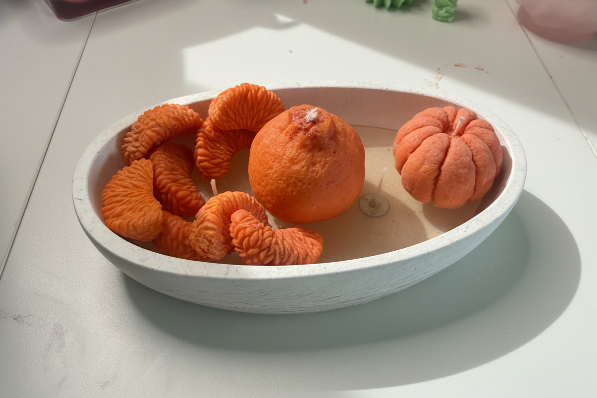 Mandarinenzauber – Handgemachte Fruchtkerze in ovaler Schale